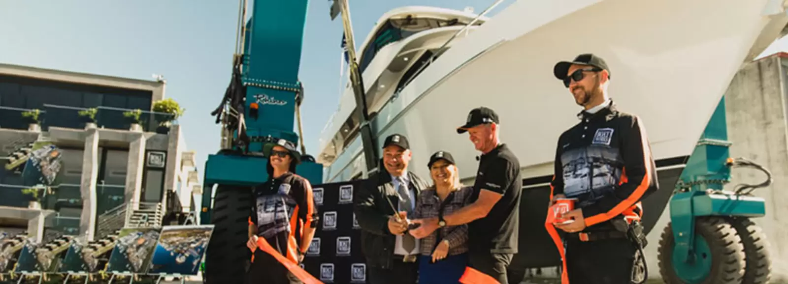 Mayor Tom Tate and The Boat Works owner Tony Longhurst with others cutting the rope at the official opening ceremony at the Northen Superyacht Yard at The Boat Works
